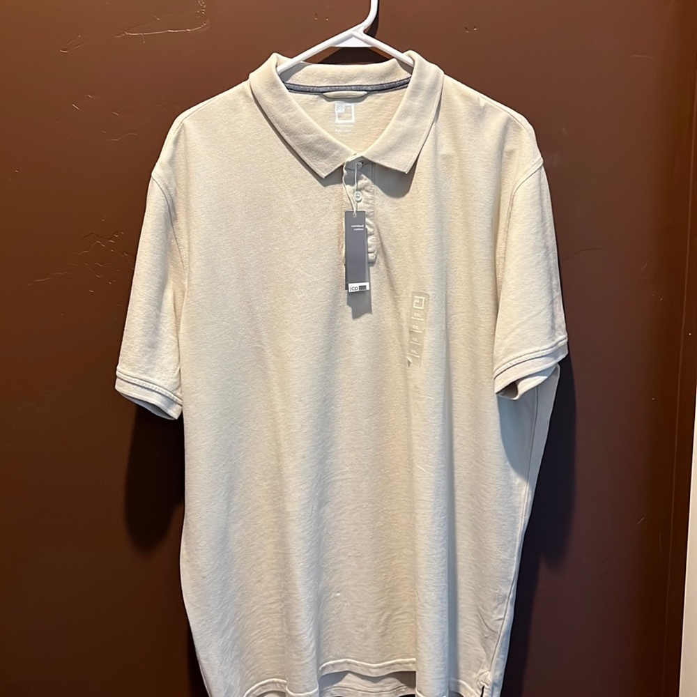 J C Penny polo shirt in a light tan.